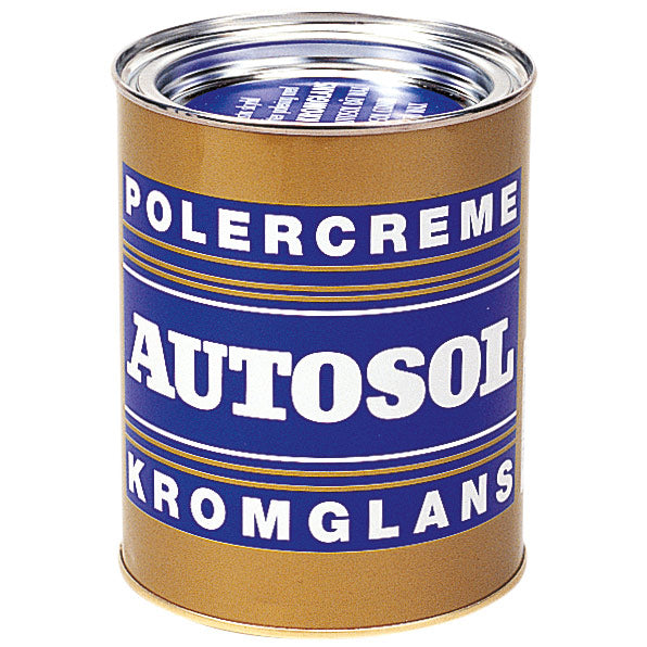 Autosol polermiddel på hvid baggrund, sikkerhedsetikette synlig.